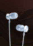 White earphones on a dark backdrop
