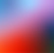 A gradient background of blues, reds, pinks and black.